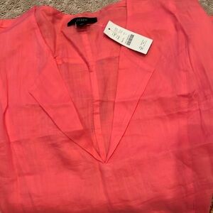 Long sleeve coral shirt.